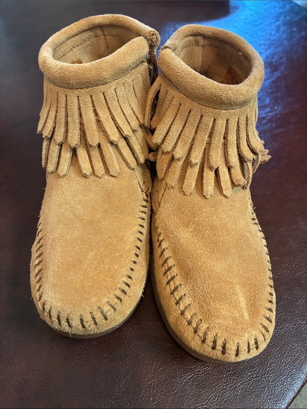 Minnetonka Kids Suede Moccasin Boots in Tan with Fringe